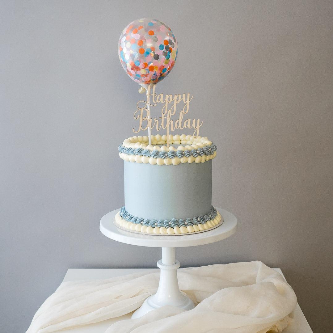 Pastel confetti balloon birthday cake